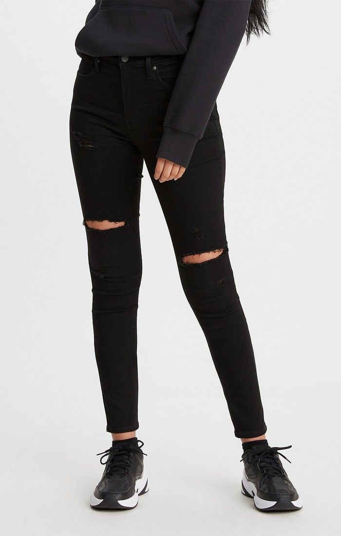 Women's Levi's 721 black jeans with holes